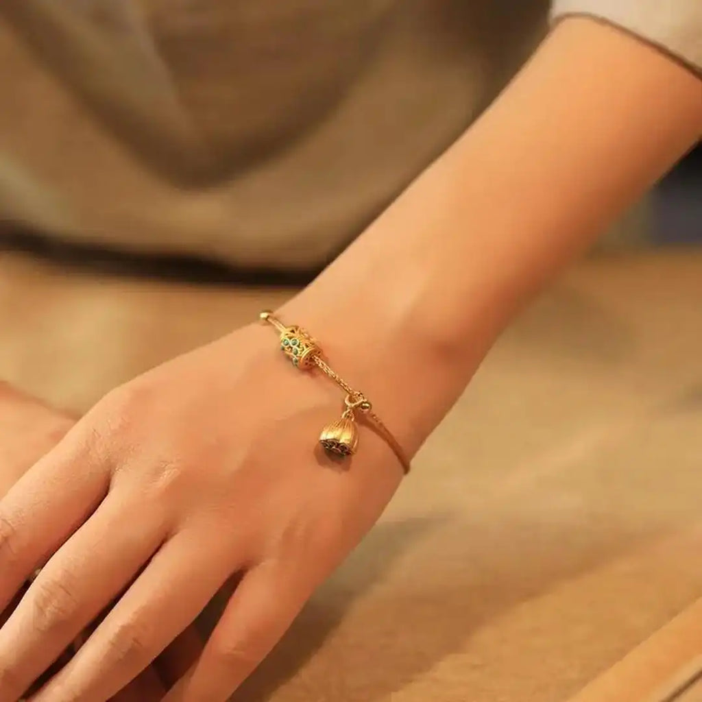 Pulsera de Loto Turquesa en Oro Antiguo