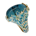 Anillo Elegante de Flor Dorada con Piedra Azul