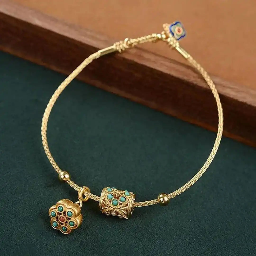 Pulsera de Loto Turquesa en Oro Antiguo